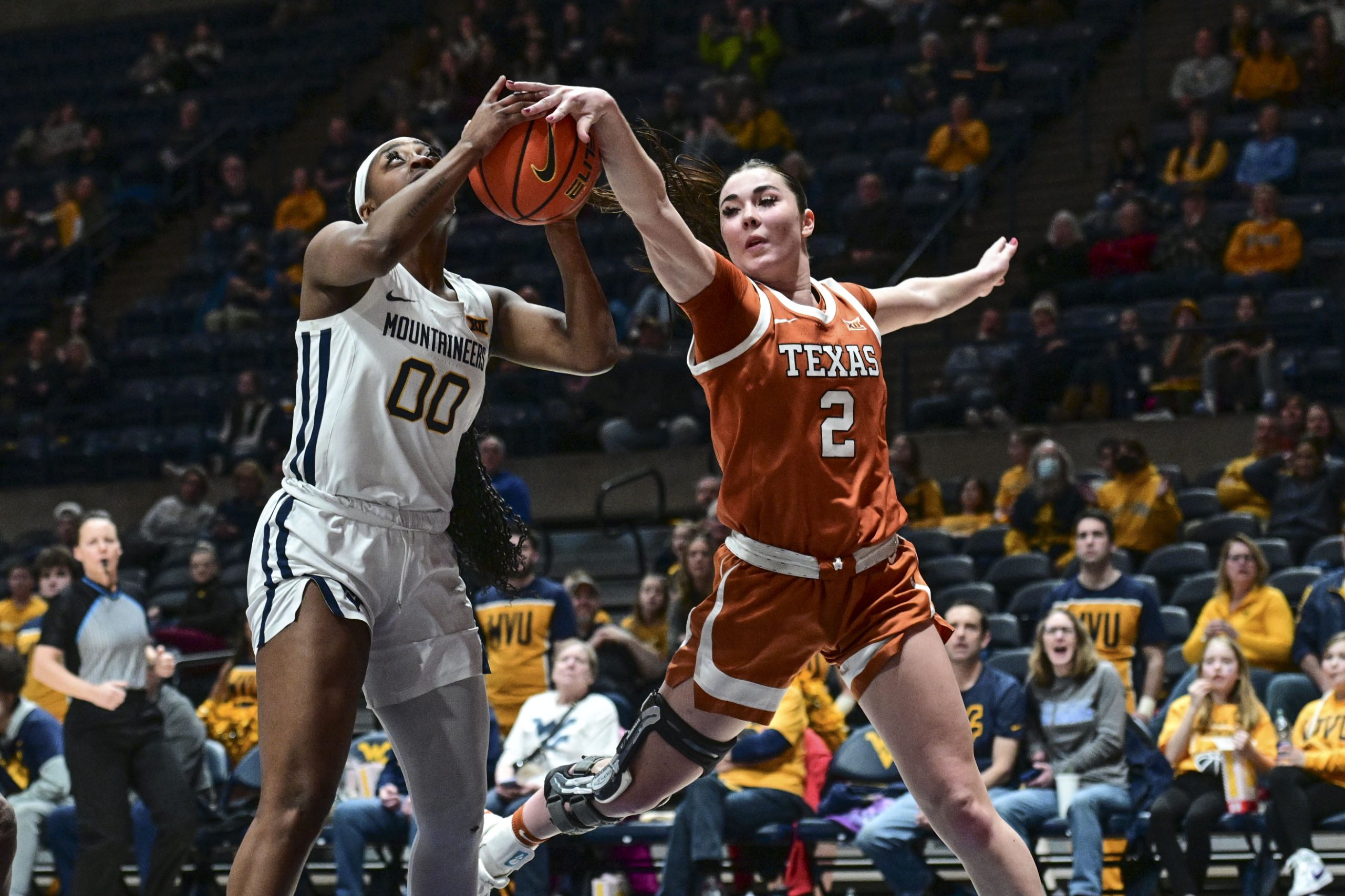 No. 24 Texas powers its way past WVU